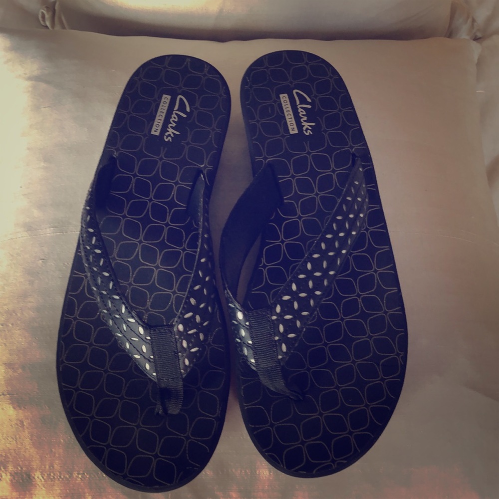 Clark’s black and silver sandals